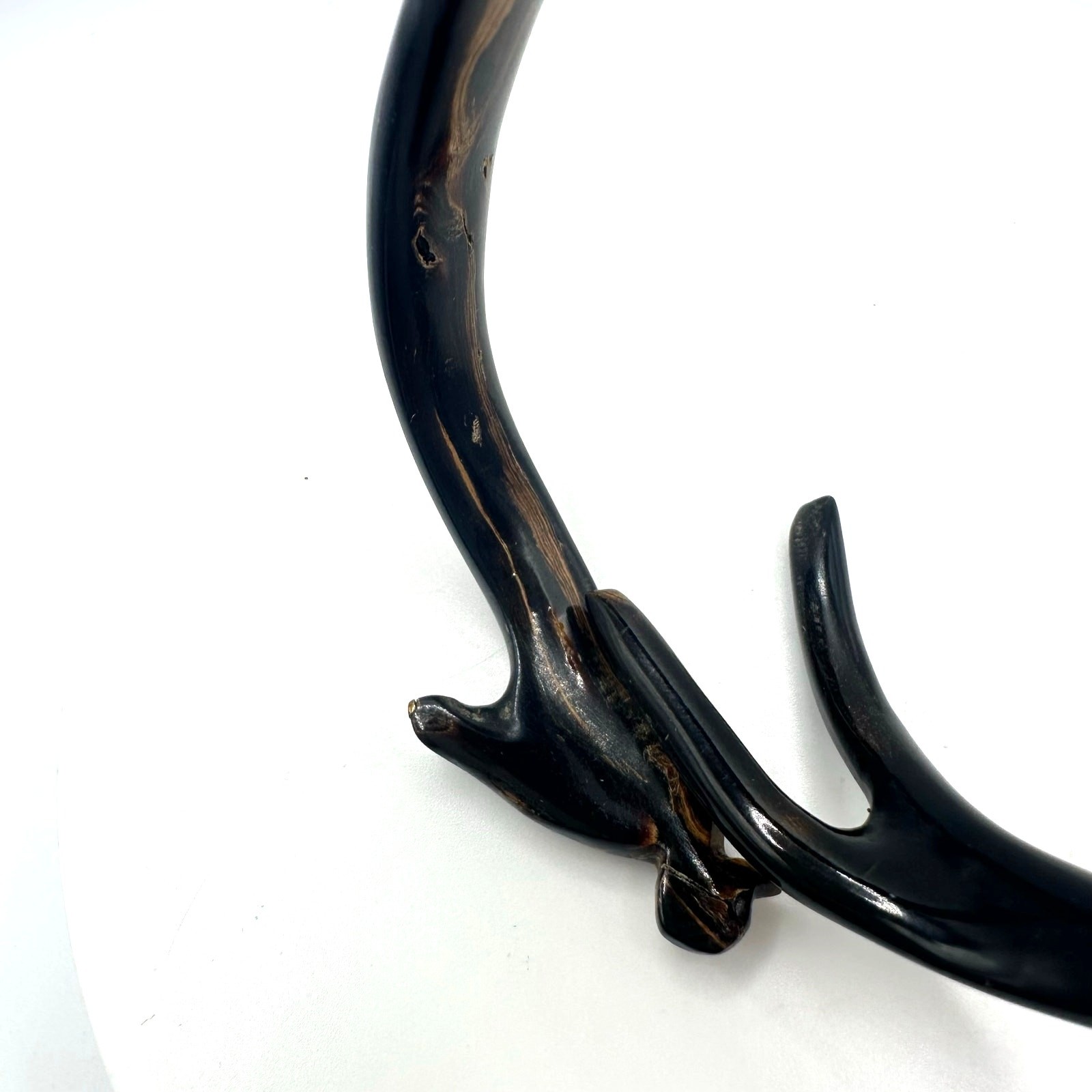 Vintage carved genuine black coral bird figural bypass bangle bracelet