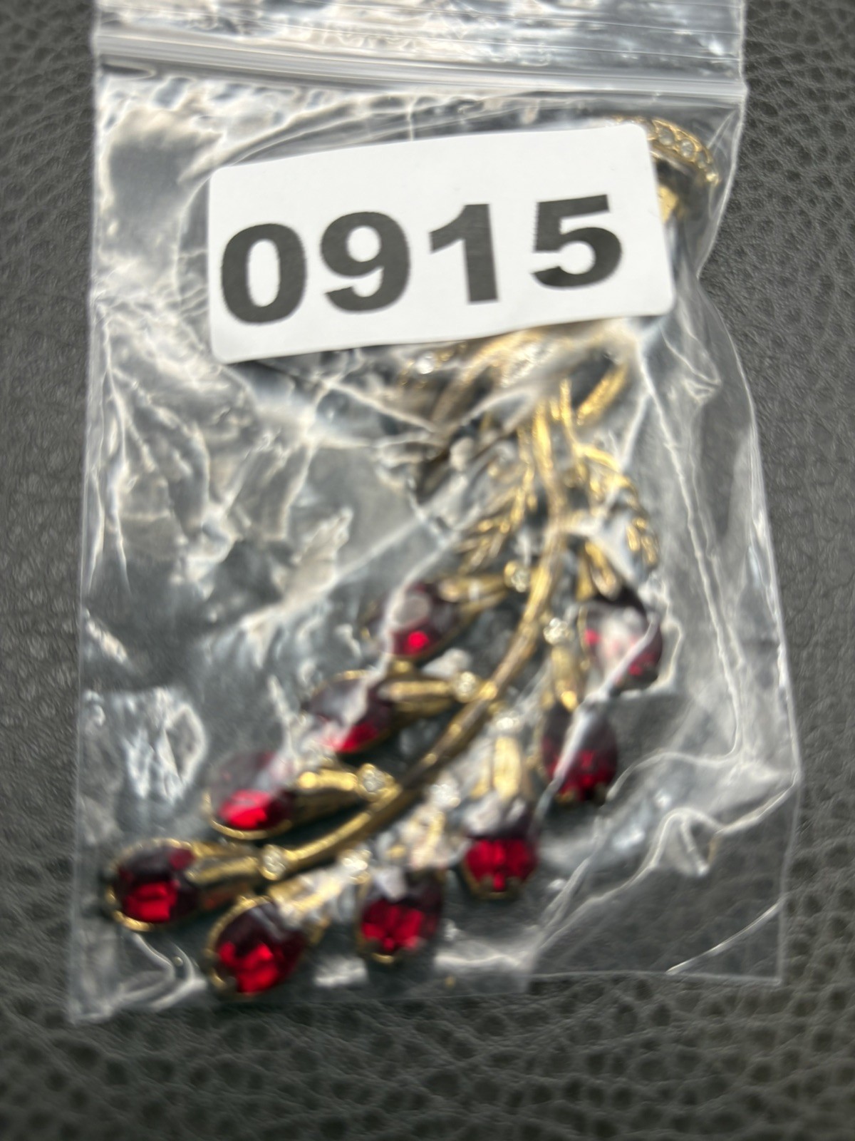 Vintage 4.25” HUGE Pot Metal Hand Holding Flowers Brooch Red Rhinestone