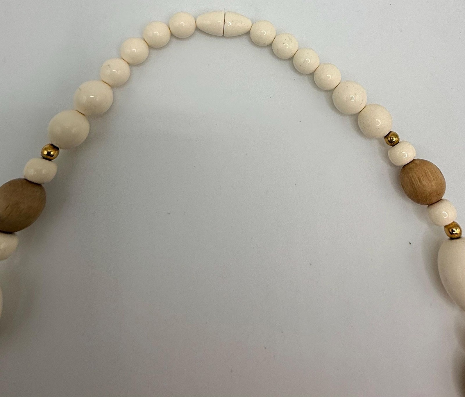 Vintage off white light wood and brown marbled amber colored beaded necklace