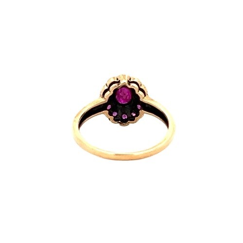 Vintage Red Oval Ruby 6×4 Halo design 1.20tcw ring 9 karat yellow gold sz 6.5