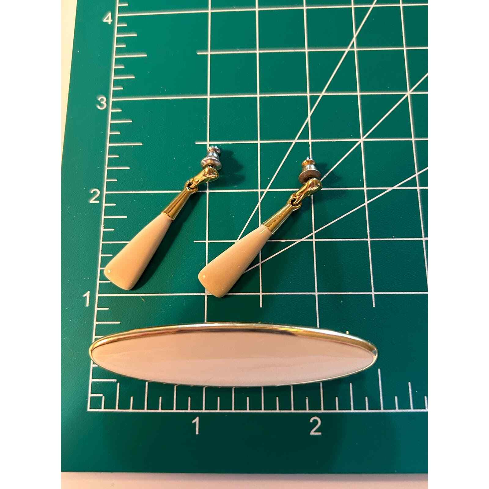 Elegant Monet Ivory and Gold Tone Oval Brooch and Earring Set