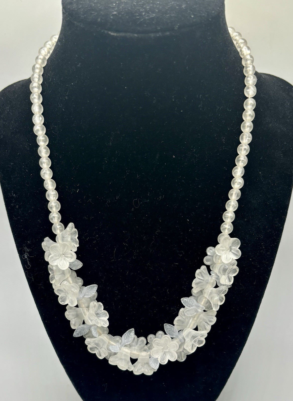 Vintage lucite floral cluster bib necklace molded flowers and leaves. 18”