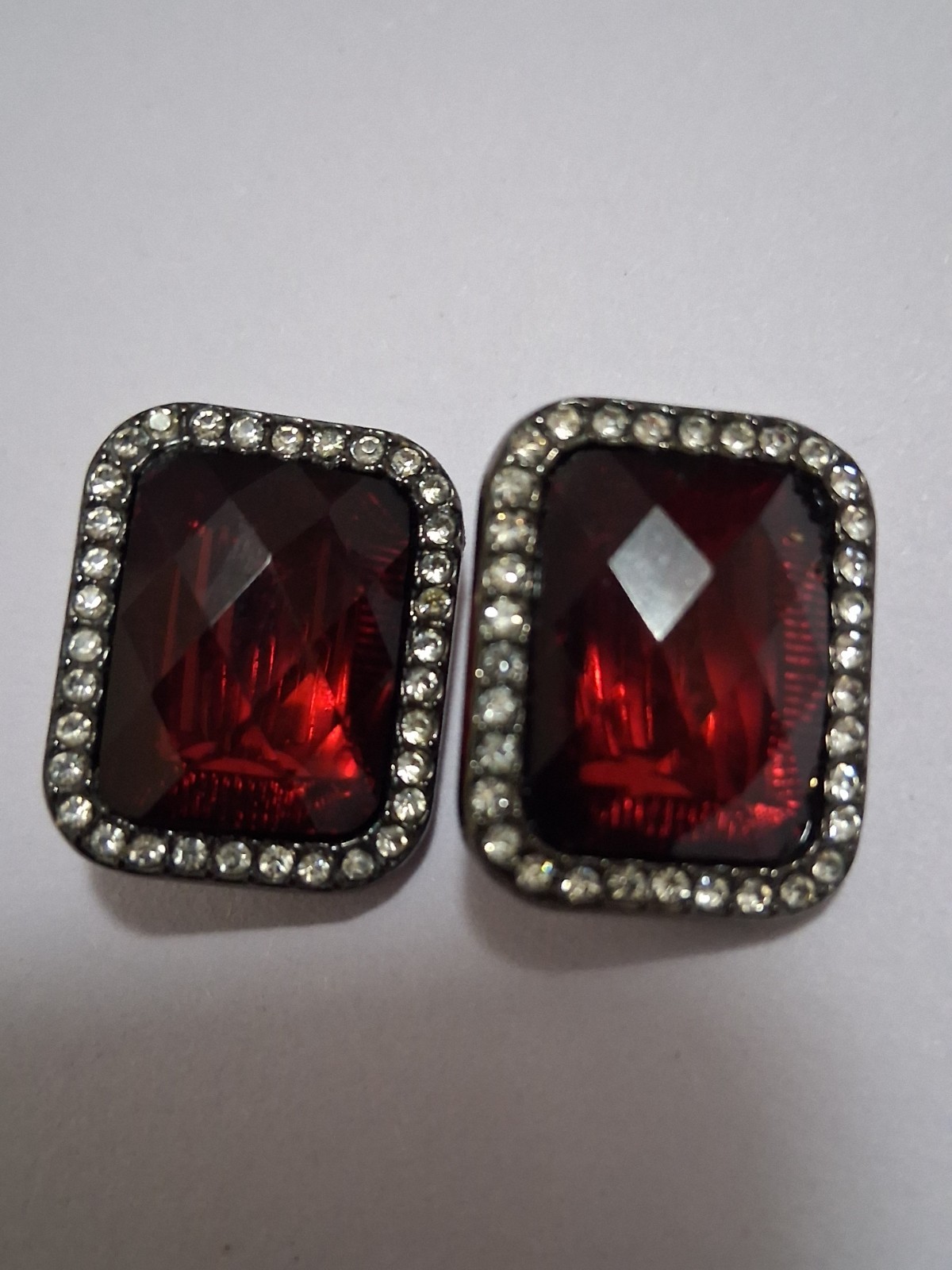 Red faceted acrylic rectangle clip on halo earrings, clear rhinestone border