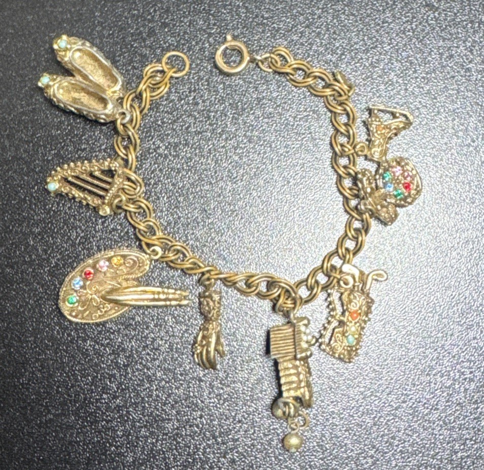 Vintage Monet Bracelet With 9 Charms Safety Chain 7.5″ 1970s 9095