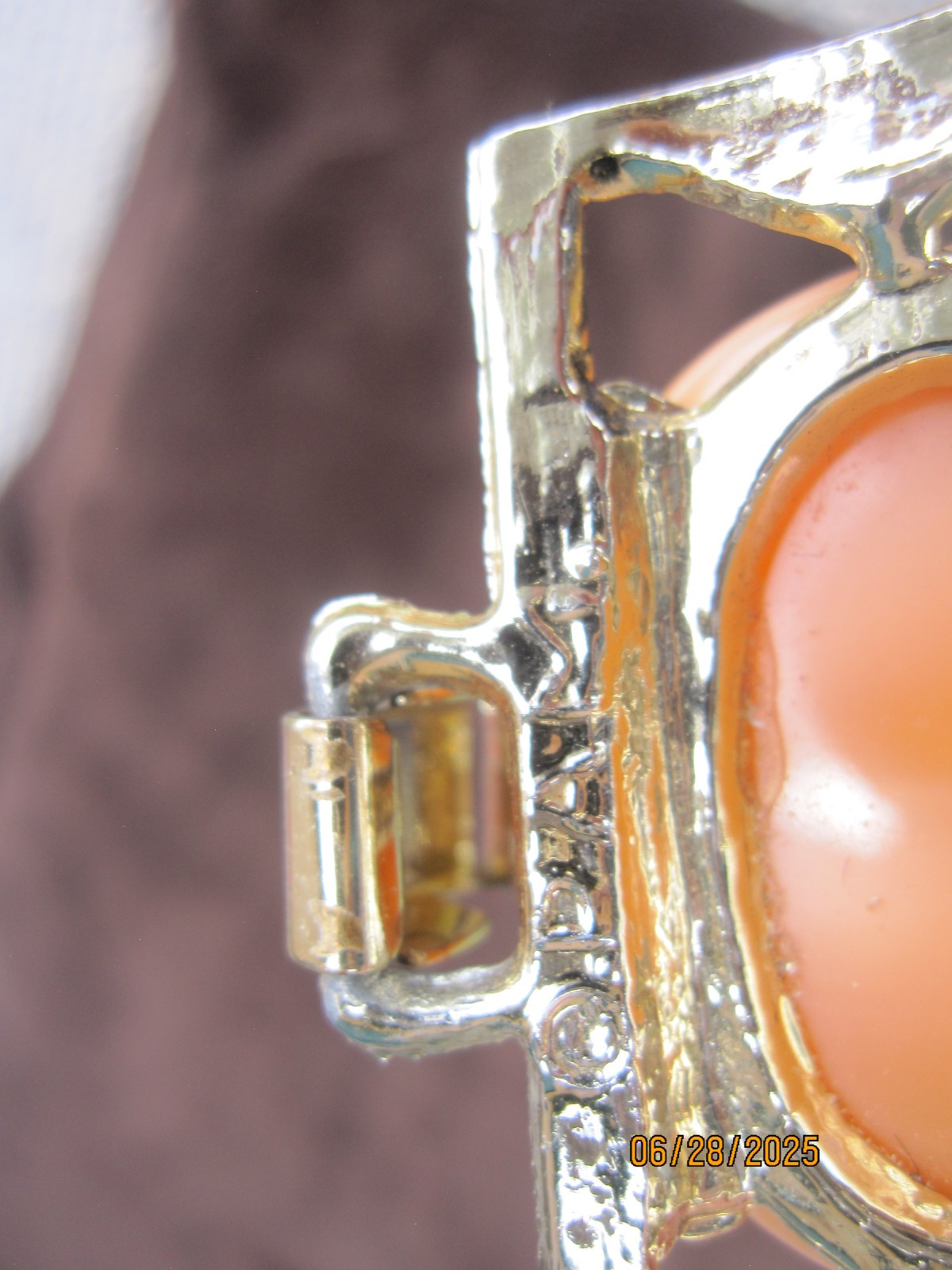 Vintage Bracelet unknown metal with orange faux stone Marked DAM