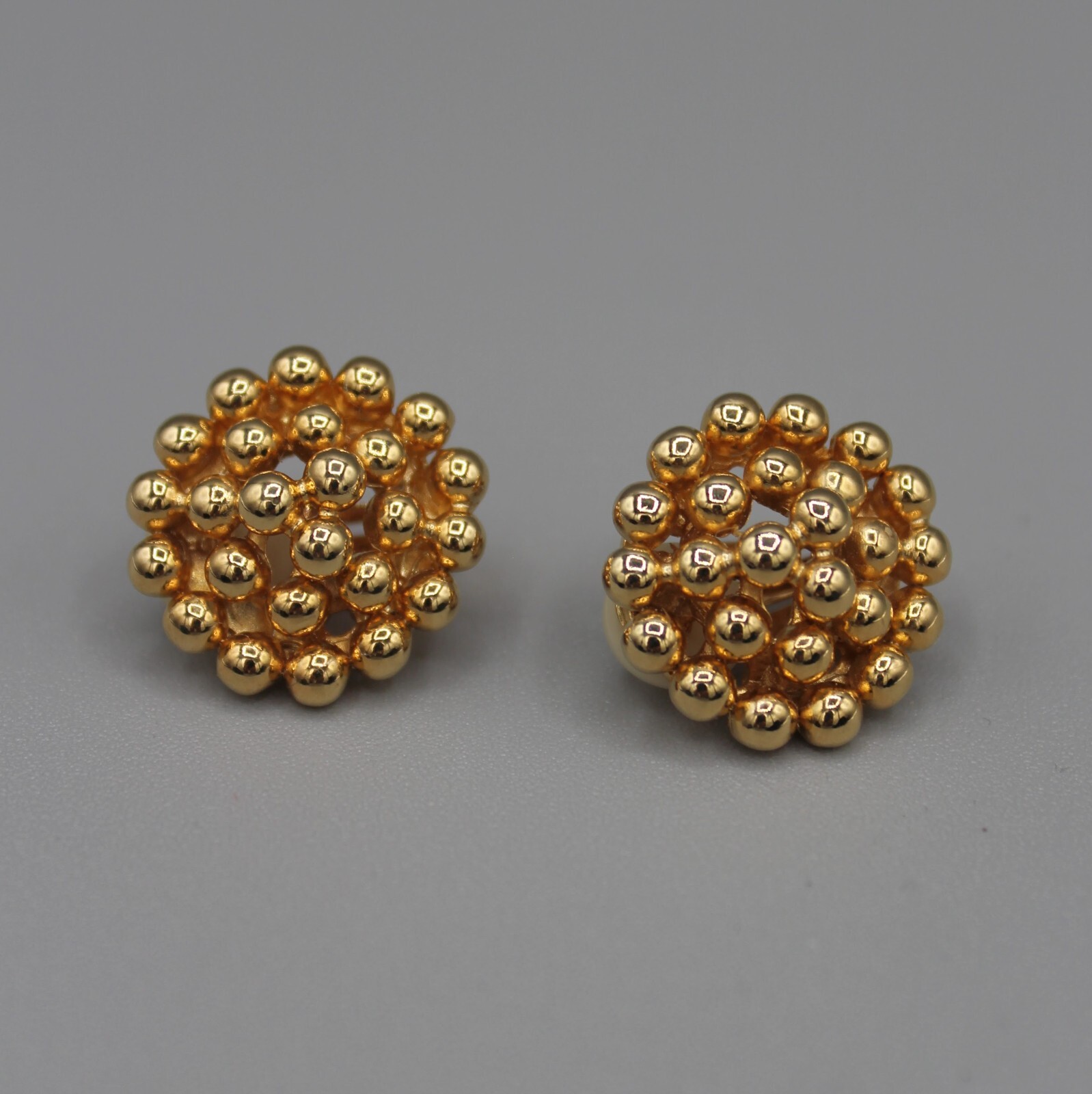 1980s Earrings Gold Tone Clip on 1950s Round F.O. Inc