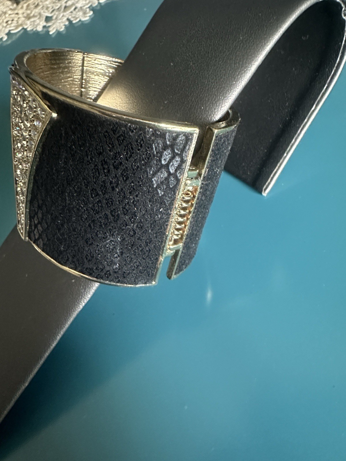 Faux black leather and rhinestone bangle cuff bracelet with gold color trim VTG