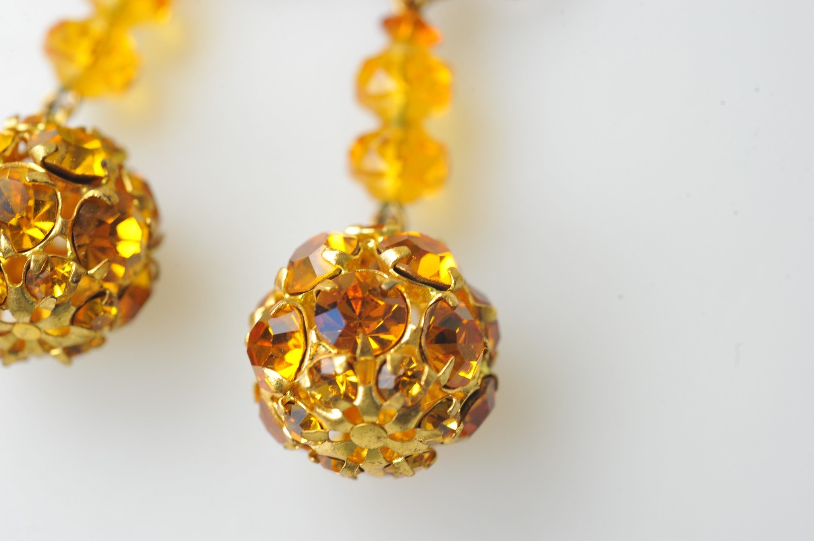 Vtg signed Miriam Haskell rhinestone Gold Tone drop clip earrings amber color