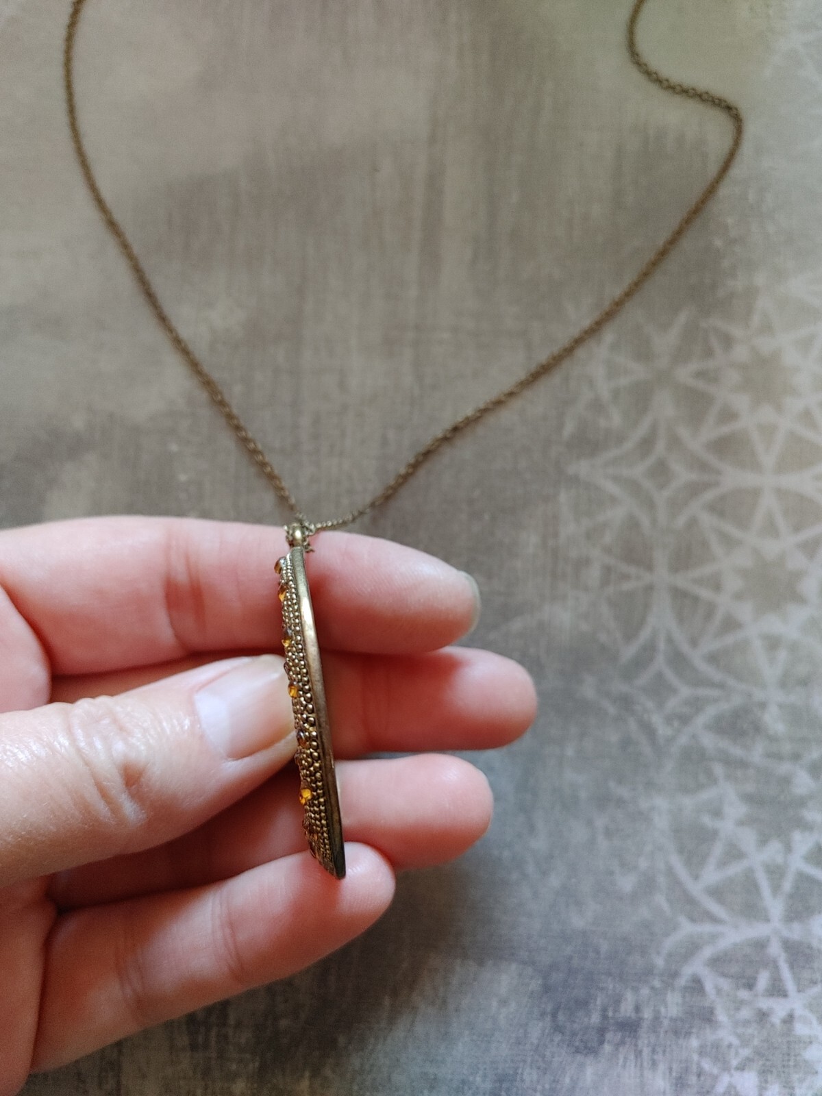 Vintage necklace gold tone metal circle yellow rhinestone signed Gwen