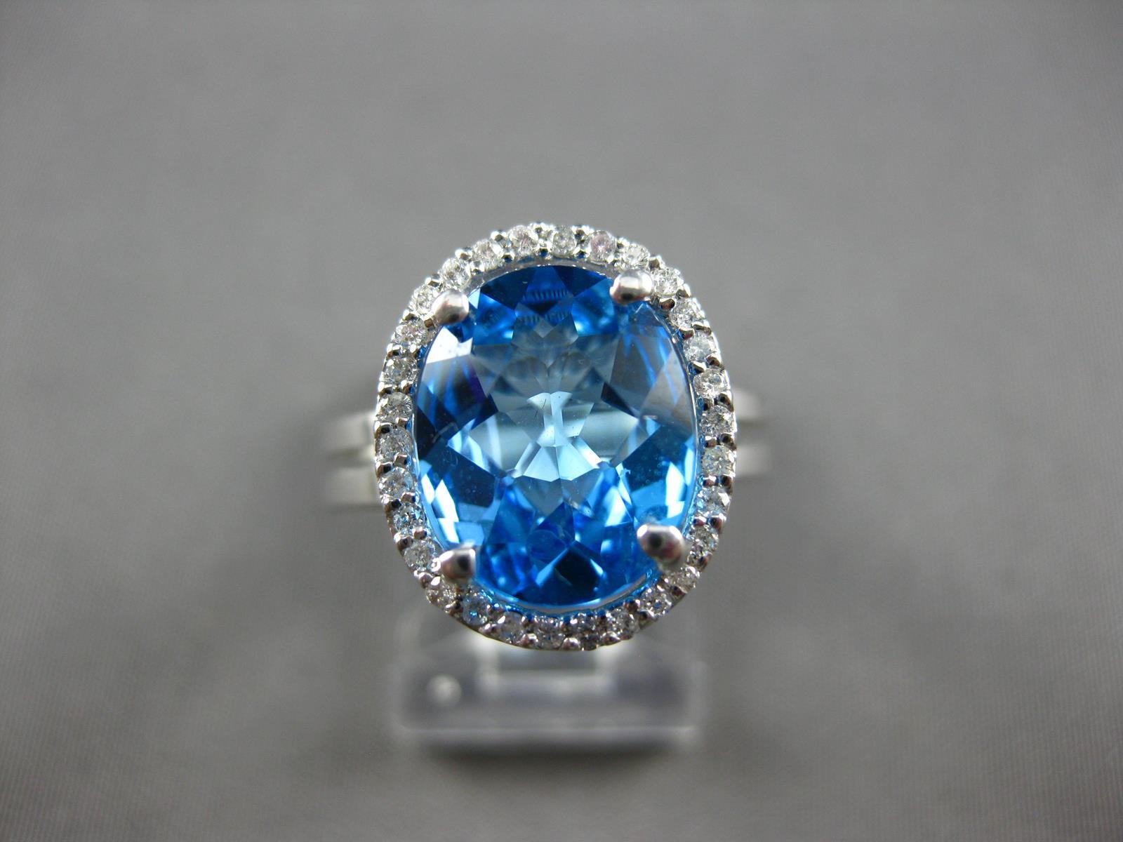 3.58CT DIAMOND & AAA BLUE TOPAZ 14KT WHITE GOLD 3D OVAL & ROUND ENGAGEMENT RING