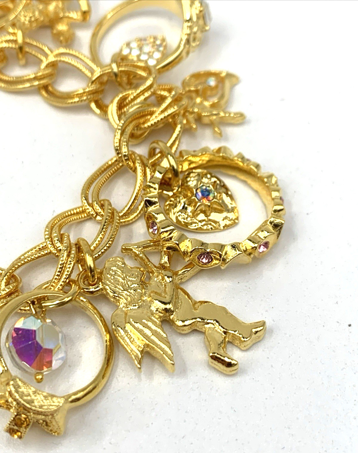 Kirks Folly Gold Tone Charm Bracelet Cupid Hearts Rings Crystals Angel
