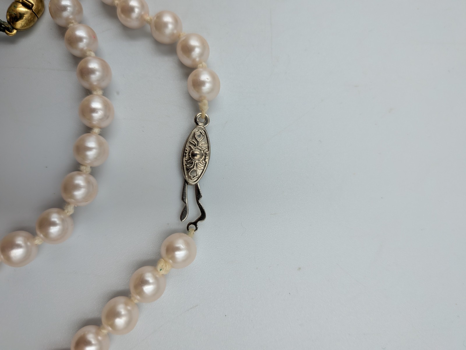 Vintage Faux Pearl Necklace Knotted with silver tone fish- hook clasp unbranded