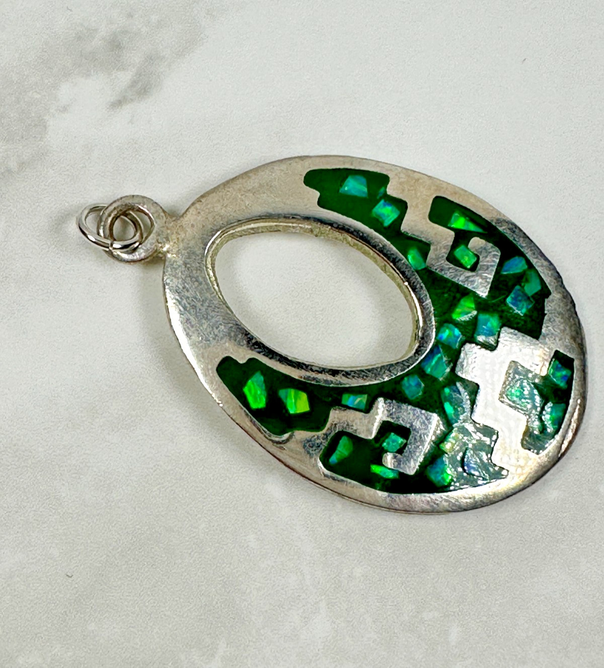 Sterling Silver Green Opal Chip Inlay Oval Cut Out Pendant – 1 1/2″ Long