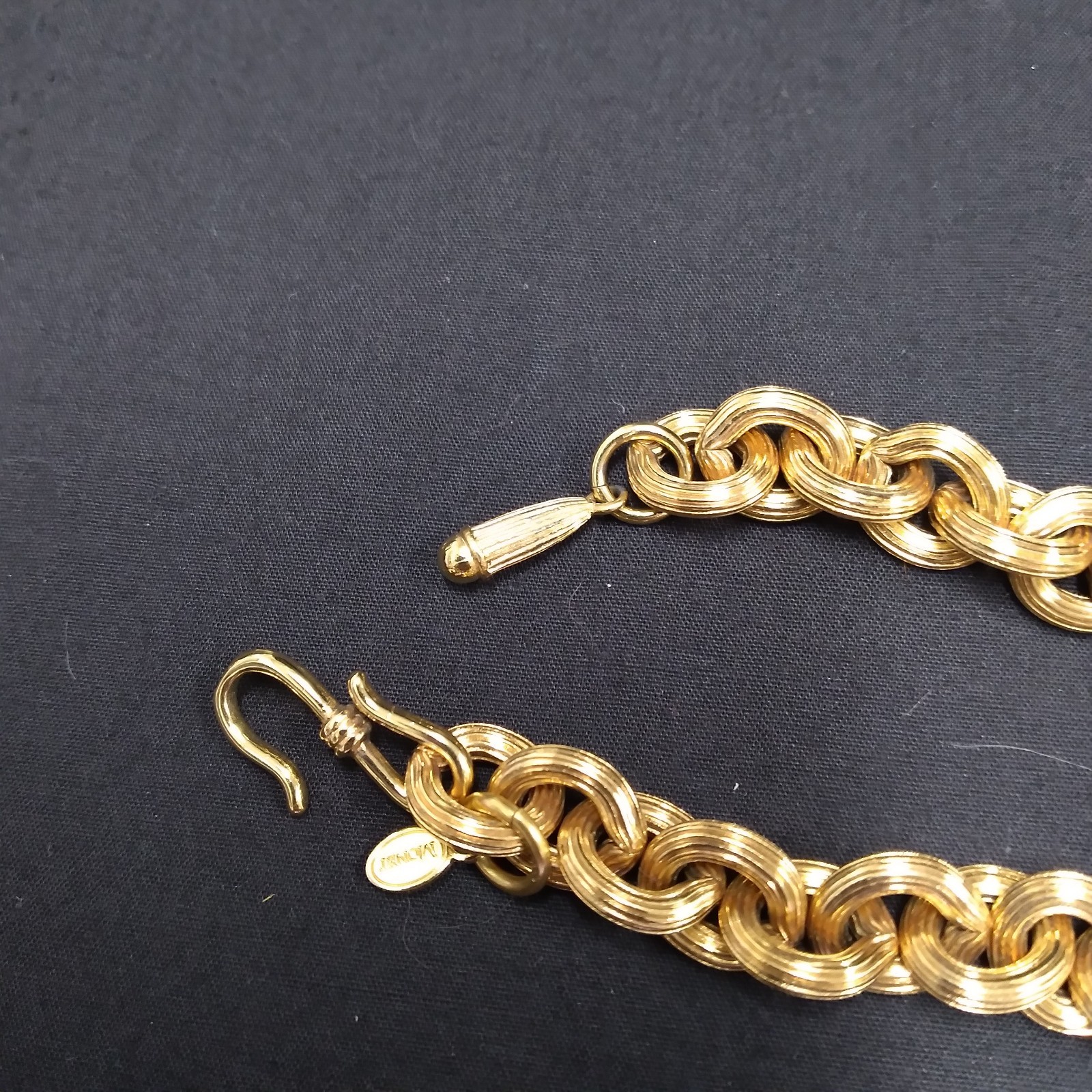 Monet Gold Tone Chunky Necklace with Clear and Black Crystal Charms