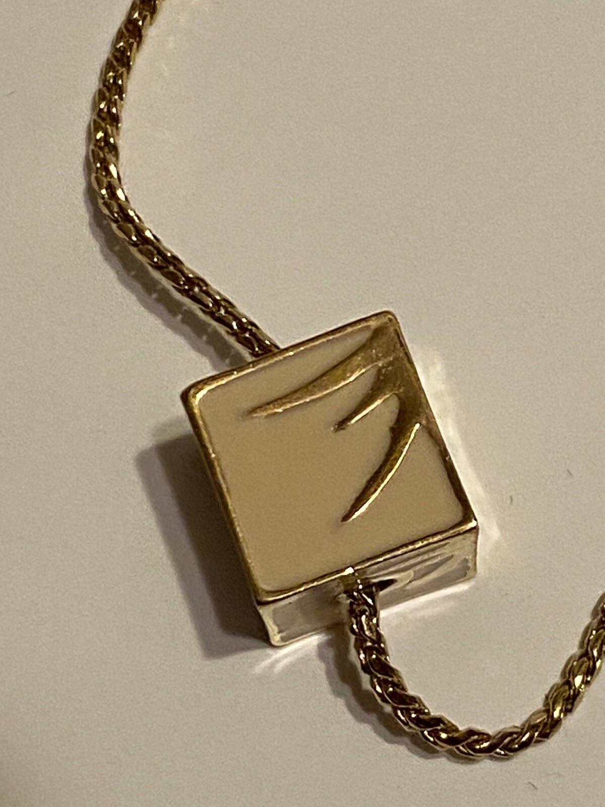 vintage Teng Yue minimalist ivory and gold colored cube on 16” gold-tone chain