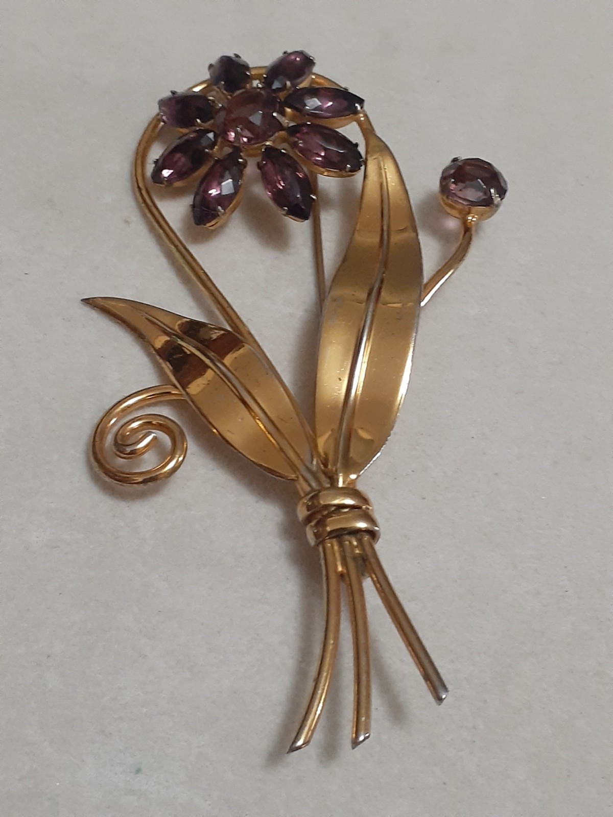 Sterling silver gold plated prong set purple glass flower & stem leaf brooch