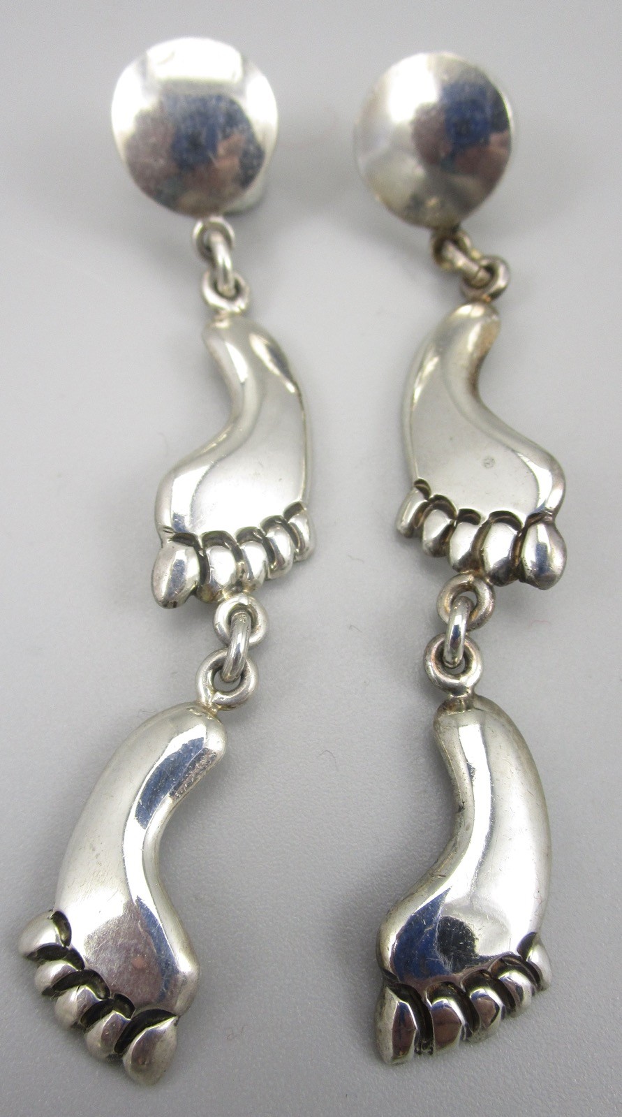 EMILIA “LOS CASTILLO” MEXICAN STERLING SILVER DANGLING FOOTPRINT FEET EARRINGS