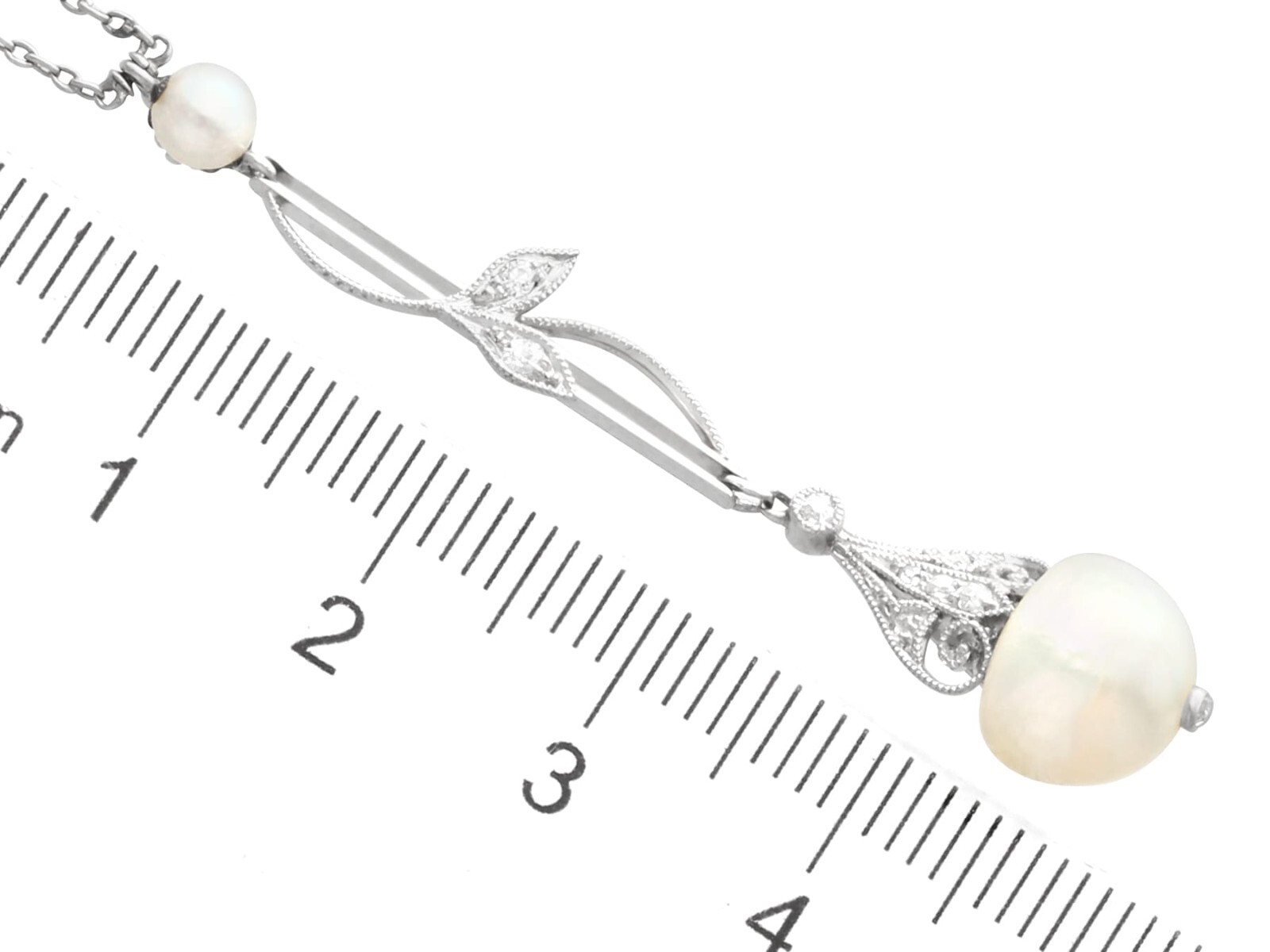 Antique Natural Pearl and Diamond, Platinum Pendant Circa 1910