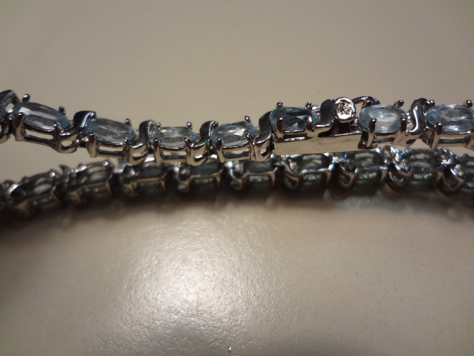 #48-DBJ-925 STERLING SILVER BRACELET LOADED WITH BEAUTIFUL STONES