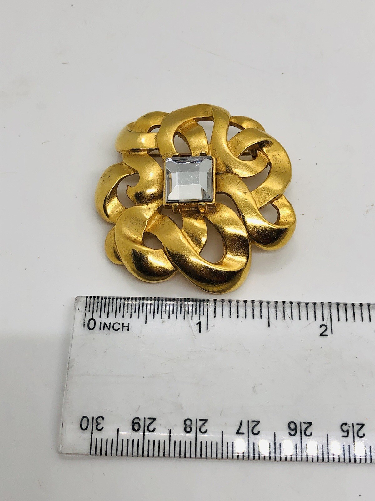 LCI Liz Claiborne brooch goldtone square rhinestone ribbon swirl brooch