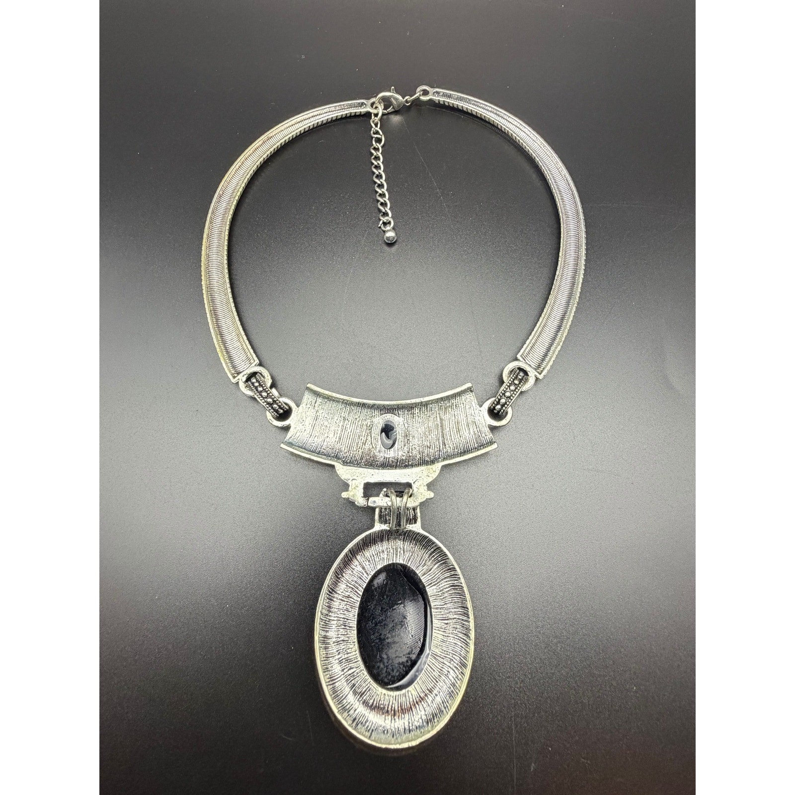 Vintage style silver-tone necklace with black enamel pendant