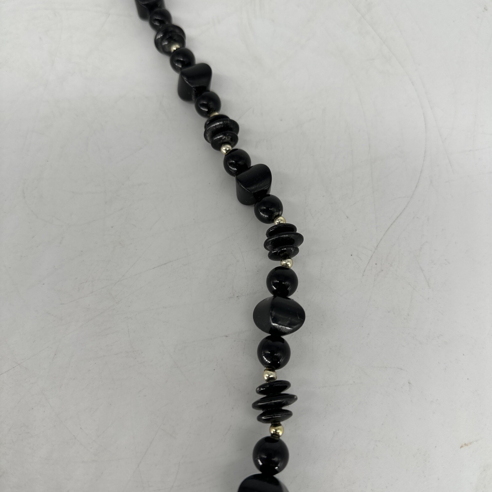 Vintage black irregular plastic bead with silver tone spacers 28″ necklace