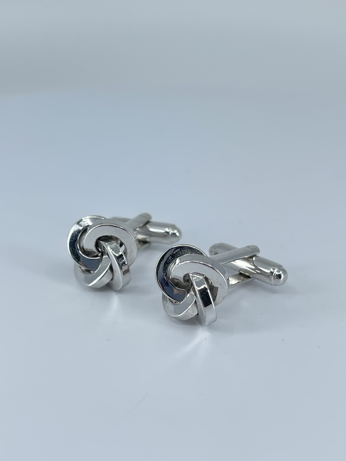 Silver tone Knot cufflinks polished metal knotted design bullet backs 7/8″