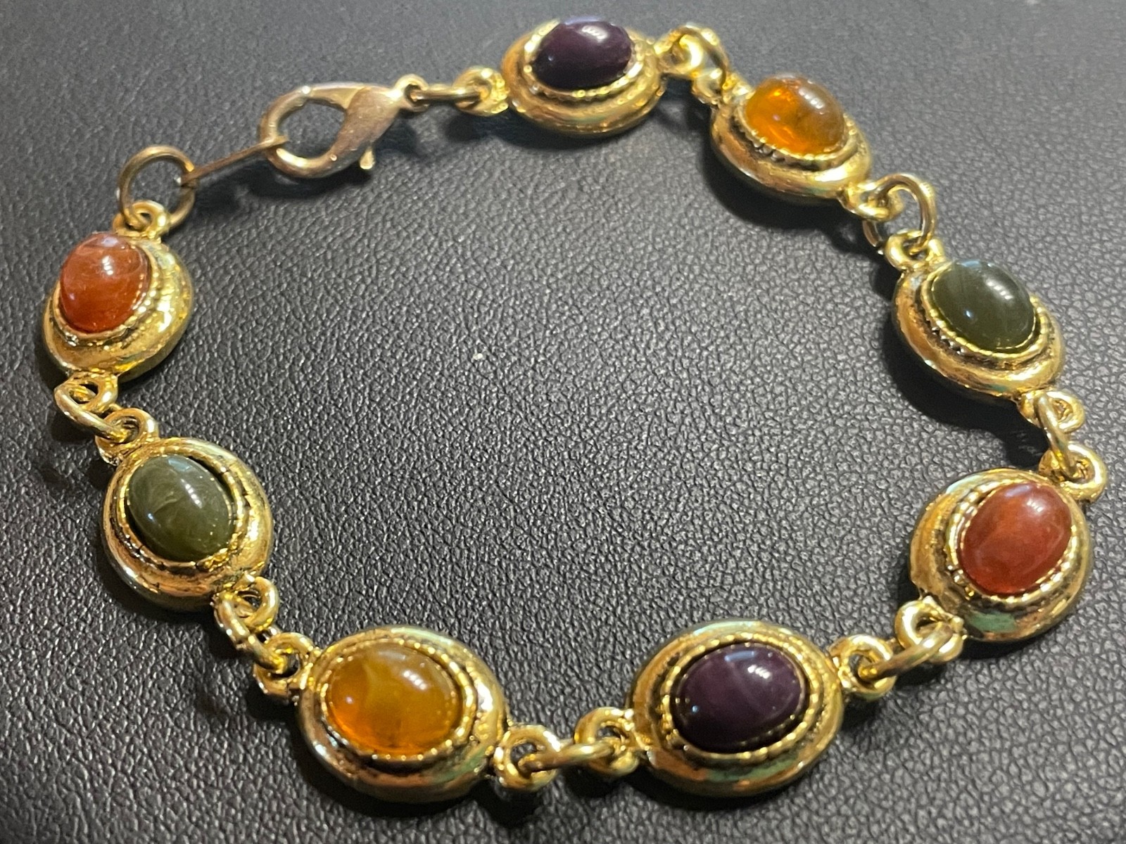 Vintage Bracelet 7.25” Naga Eye Gem Multi-Colored Gemstone amulet gold tone