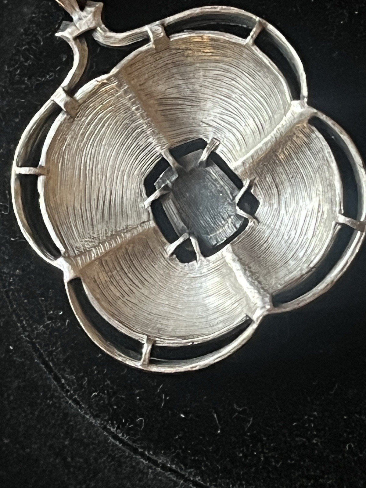 Silver Tone Raised Poppy Textured Pendant