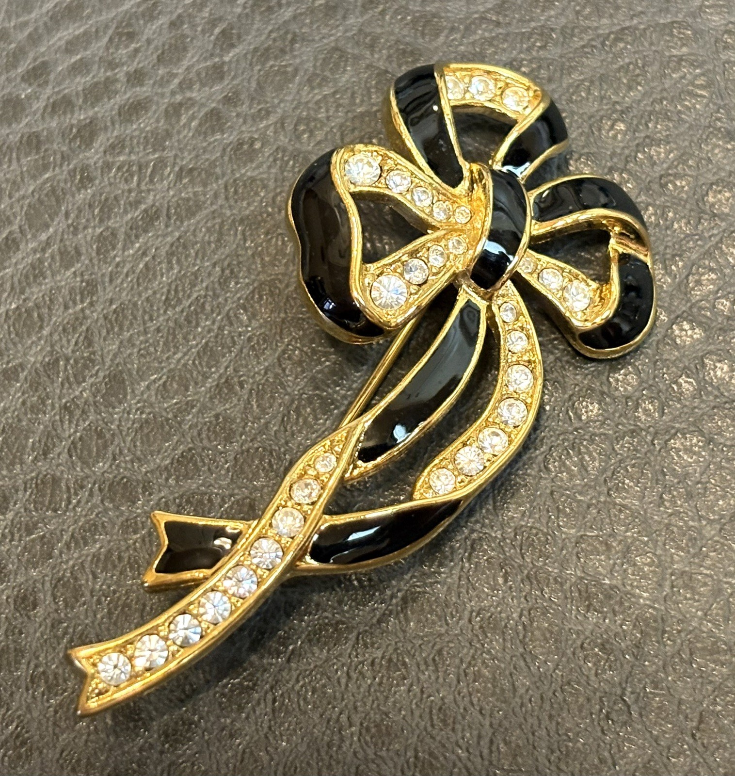 Vintage 80s Runway Gold Tone Rhinestone Black Enamel Ribbon Bow Brooch Pin