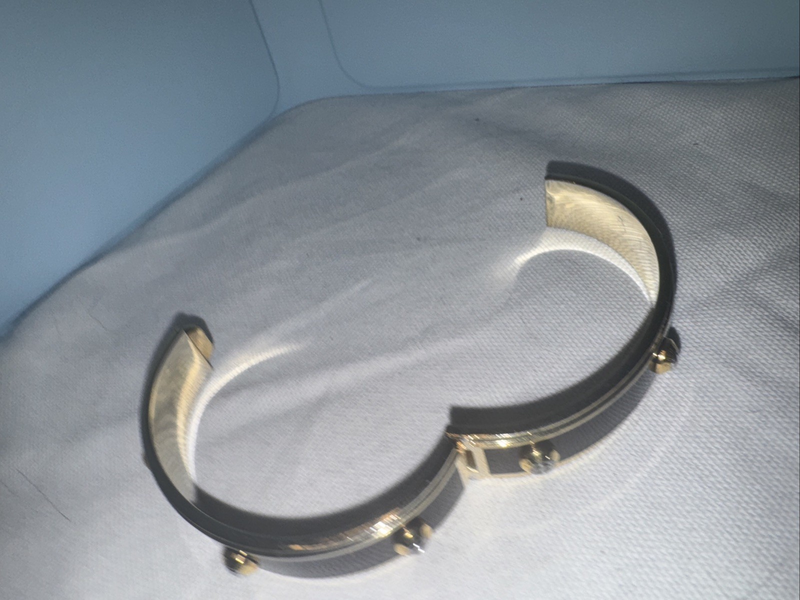 New HENRI BENDEL Goldtone Rivet w Logo Brown Metal Bangle Bracelet