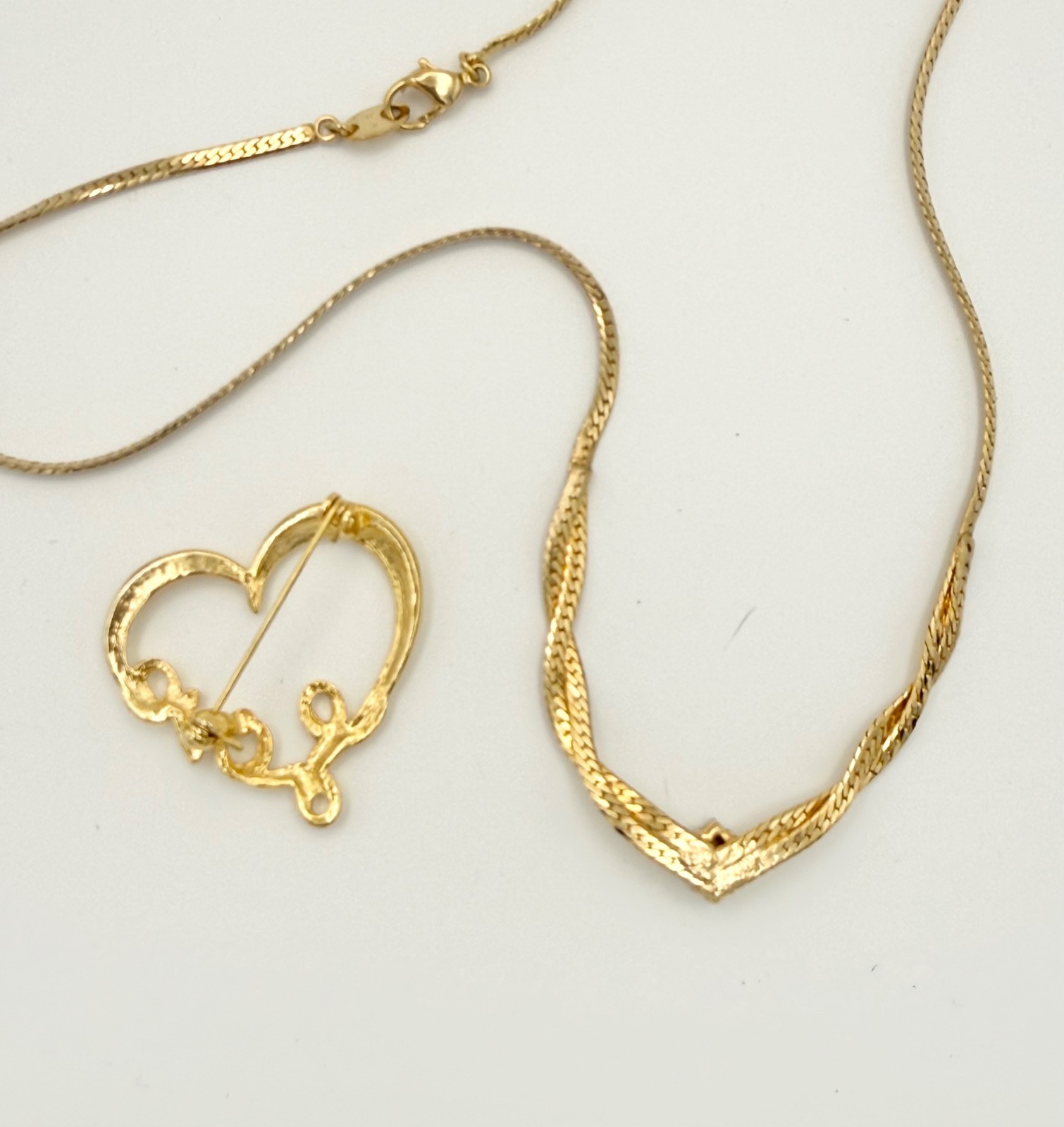 NR signed Goldtone vintage Avon necklace and unbranded brooch