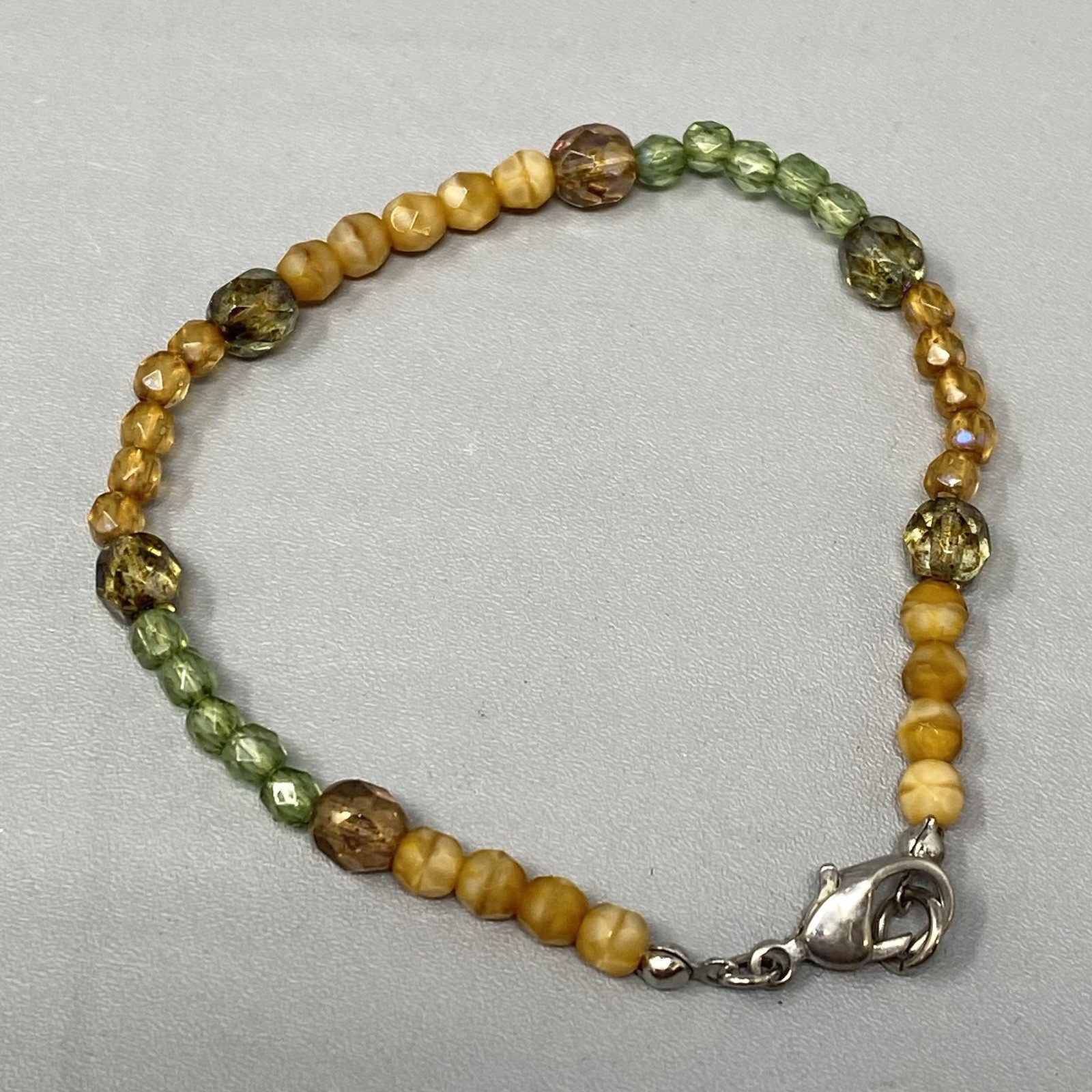 Glass Bead Bracelet Mini Green Orange Marble Faceted Fire Polished Coated 7″