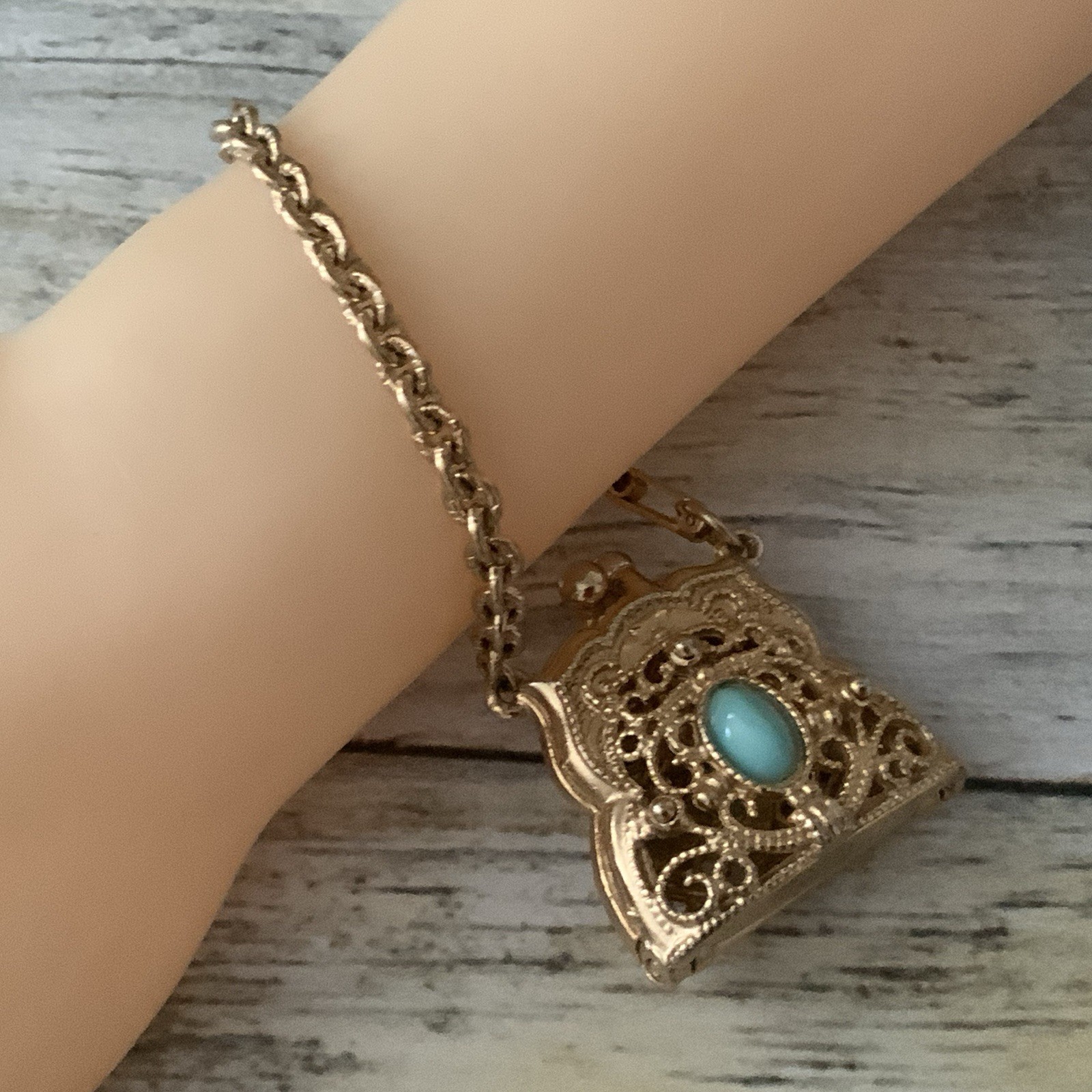 Vintage Small filigree Metal Purse charm with blue accent bracelet in gold tone