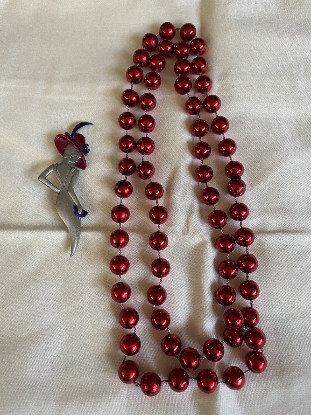 Stylized Red Hat Lady Pin And Red Beaded Necklace