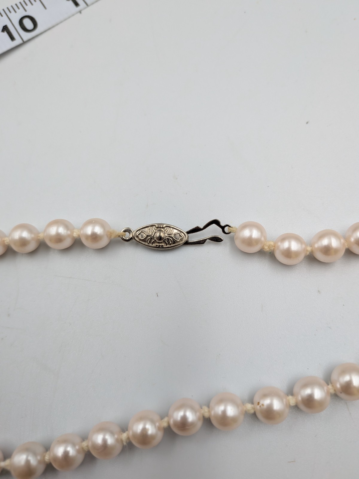 Vintage Faux Pearl Necklace Knotted with silver tone fish- hook clasp unbranded