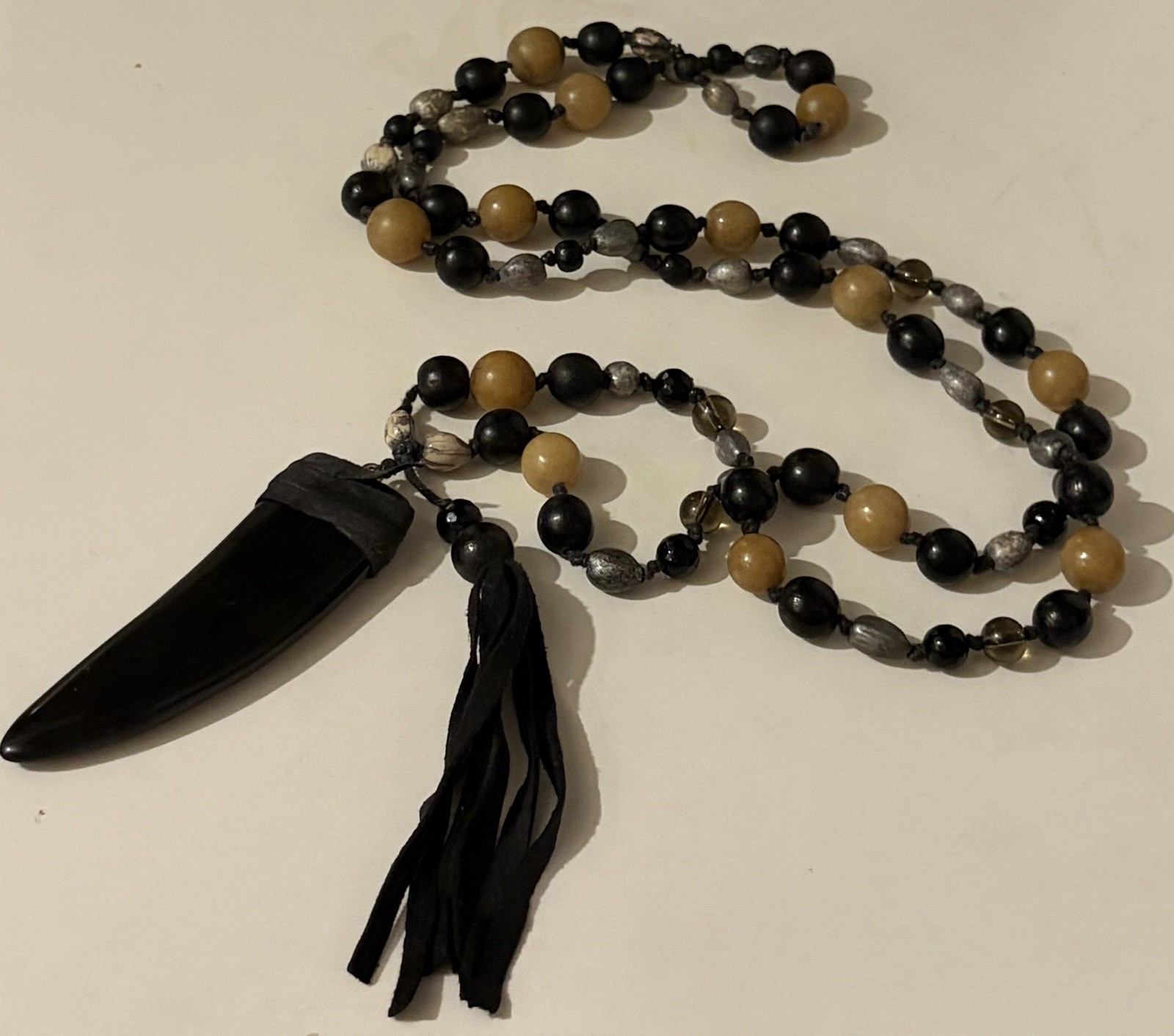 Hand Knot BOHO ~ Resin, Nut , Glass , Wood, Suede- Craftsmanship Visual Appeal