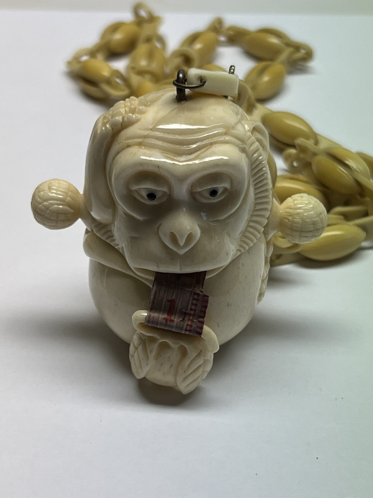 ANTIQUE ART DECO MONKEY NECKLACE TAPE MEASURE CELLULOID CHAIN PENDANT WHIMSICAL