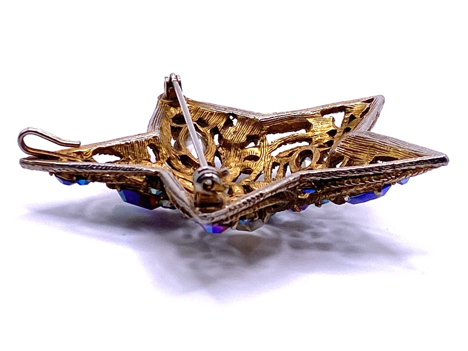 La Roco 1950s Star Brooch Colorful Gold Tone Rhinestones Textured Gold Plate