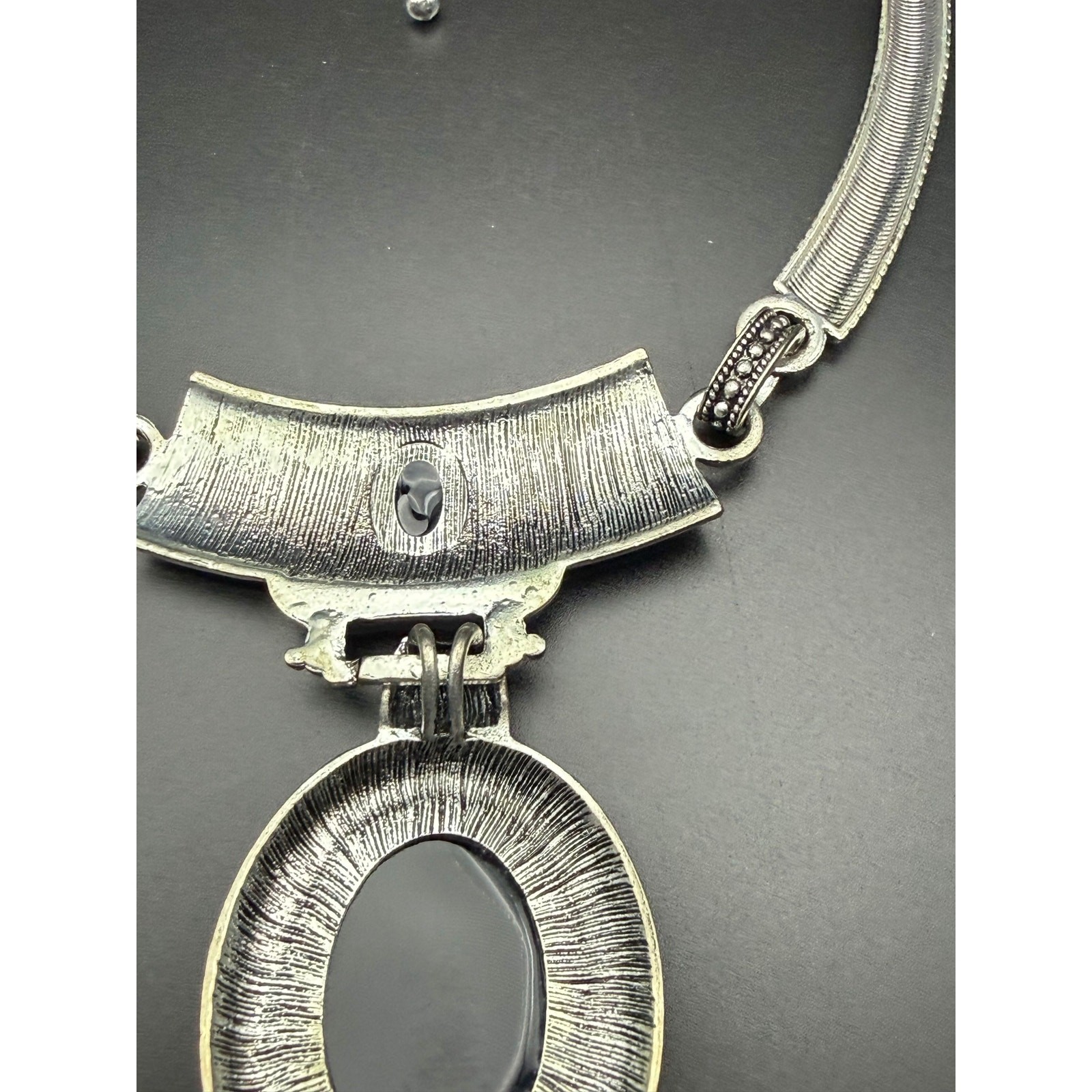 Vintage style silver-tone necklace with black enamel pendant