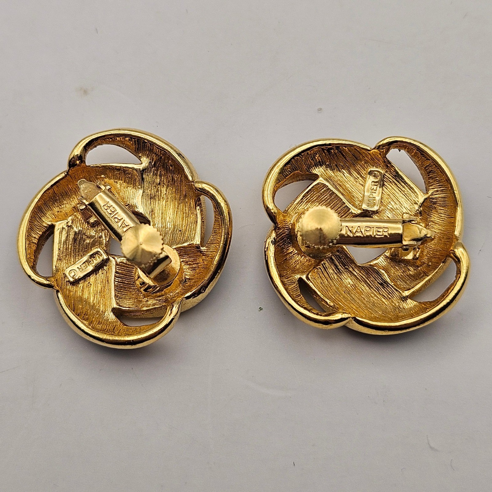 Napier Vintage Black Enamel Gold Tone Interlocking Knot Screw Back Clip Earrings