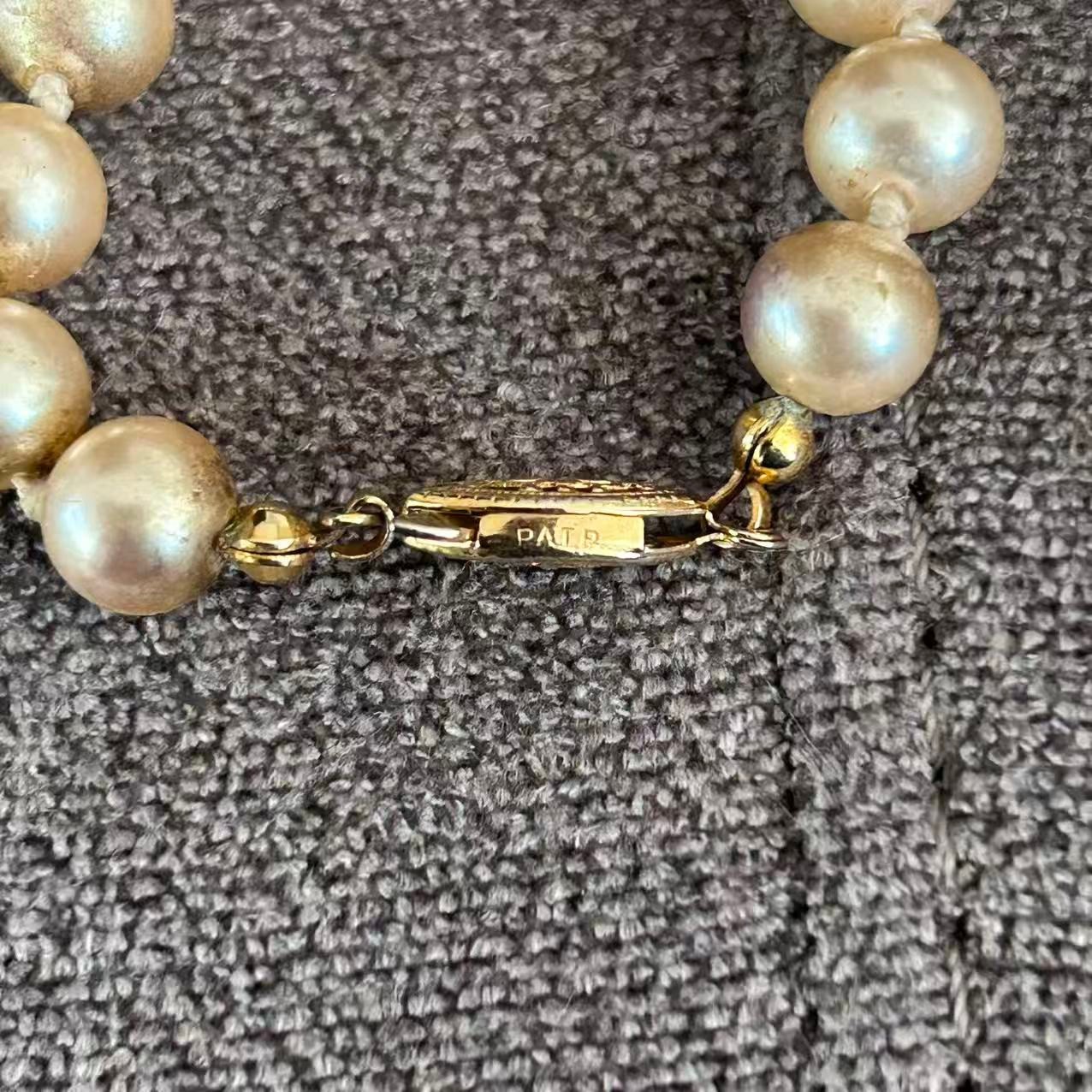 Vintage Champagne Faux Pearl Necklace Gold Tone Filigree Clasp Knotted 30″