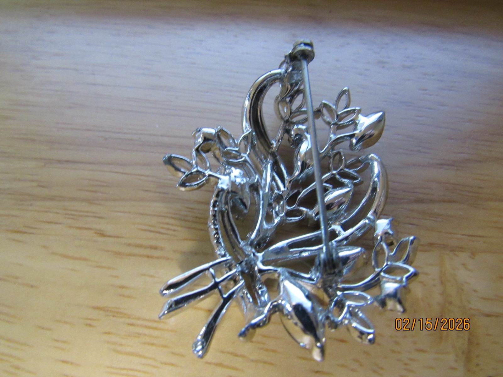 VTG. UNSIGNED CORO? SILVERTONE BLUE RHINESTONE BOUQUET 2″