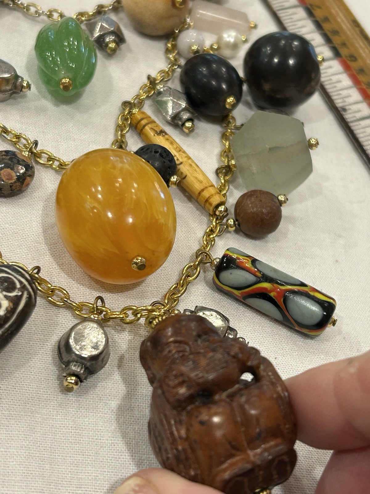 Vtg Asian-Themed Mixed Material 3-Strand Charm Necklace w/Carved Wood Buddha 28”