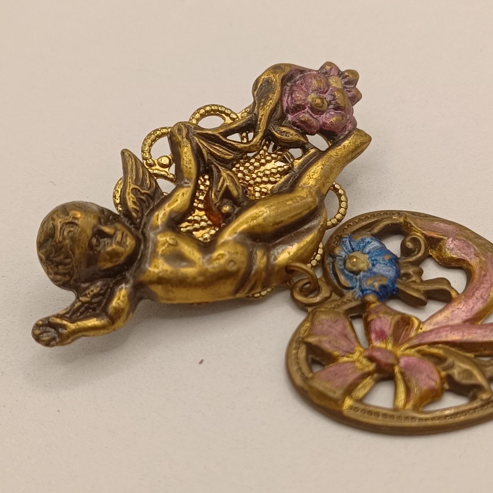 Brass Cherub with Heart Dangle Purple and Blue Enamel flowers and bow Pin Brooch