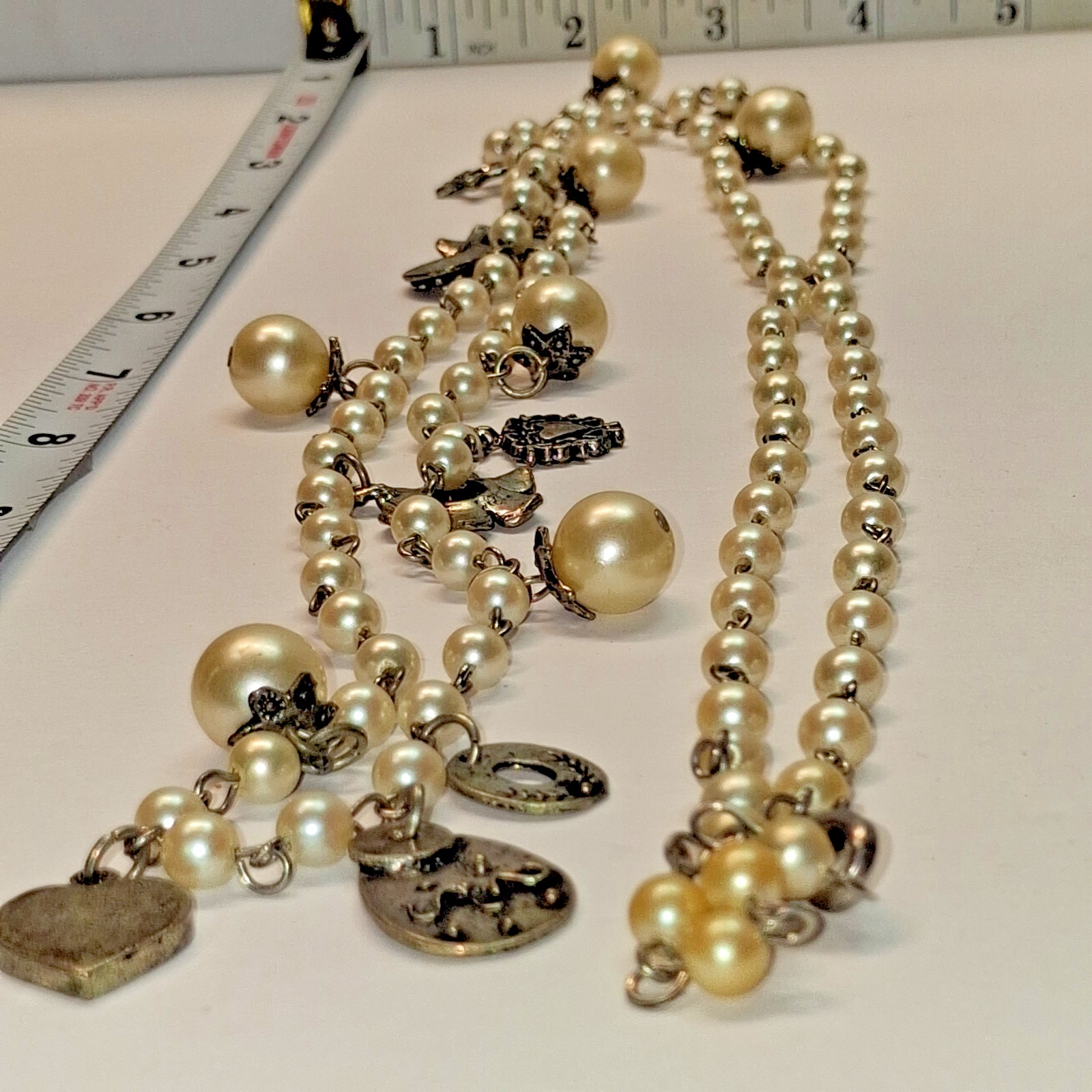Long 26″ Vintage Silver Charm and Simulated Pearl Necklace Hearts,Flowers,Stars