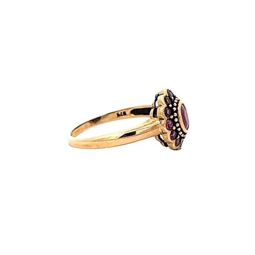 Vintage Red Oval Ruby 6×4 Halo design 1.20tcw ring 9 karat yellow gold sz 6.5
