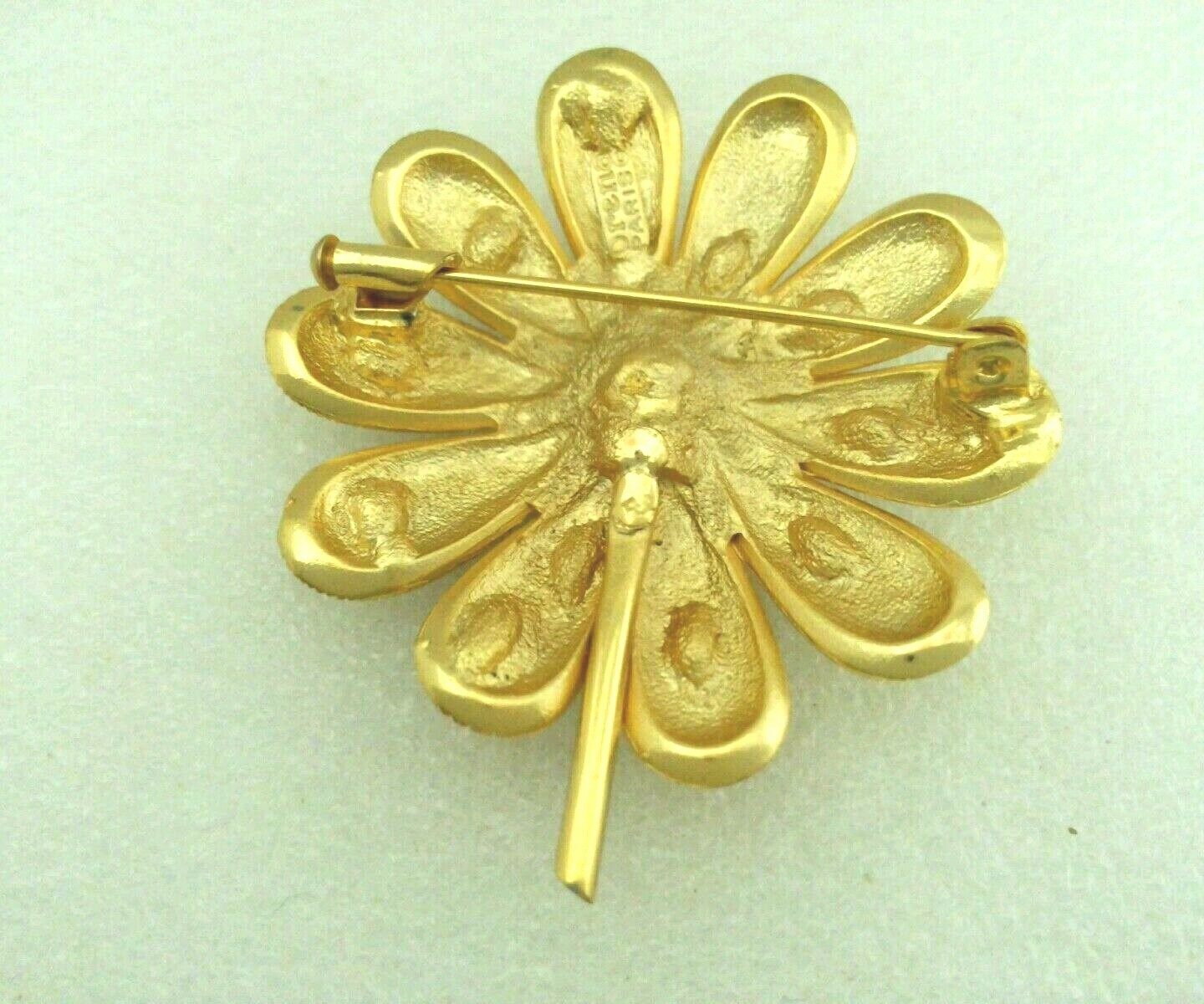 KN. “Orena” Paris Gold Tone Flower Brooch with Clear & Black Crystal signed