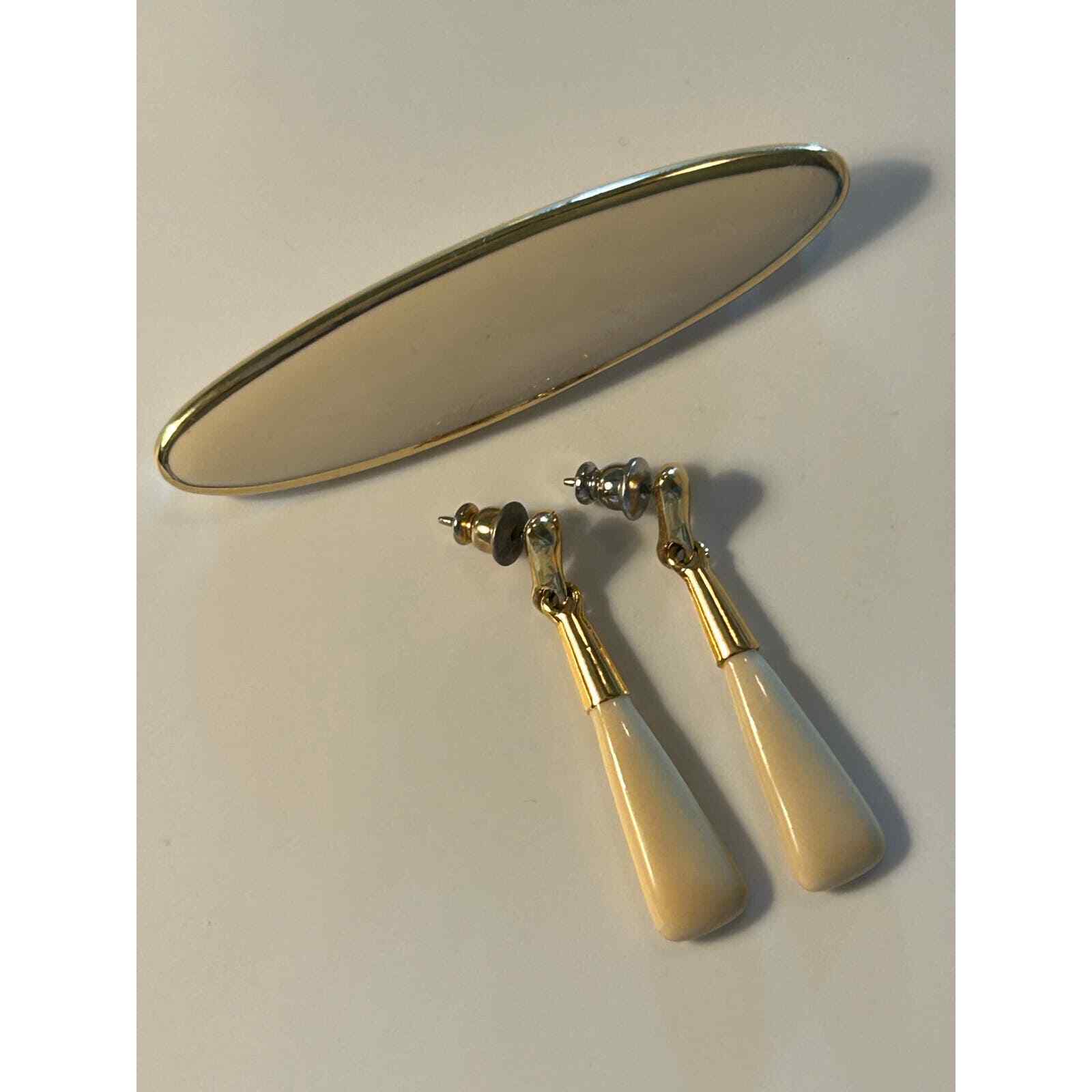 Elegant Monet Ivory and Gold Tone Oval Brooch and Earring Set