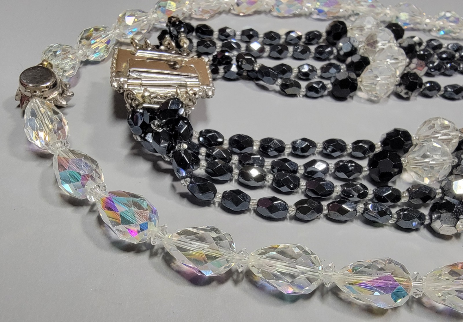 Sandor 4 Strand Black Crystal Signed Beaded And AB Clear Faceted Oval Necklaces